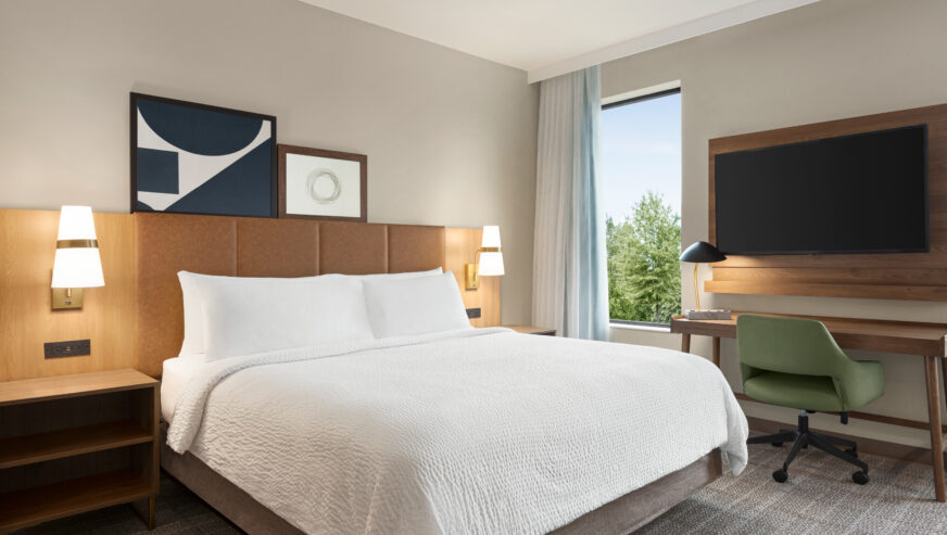 Staybridge Suites Rehoboth Beach – Spacious suite with a comfortable seating area, and modern decor.